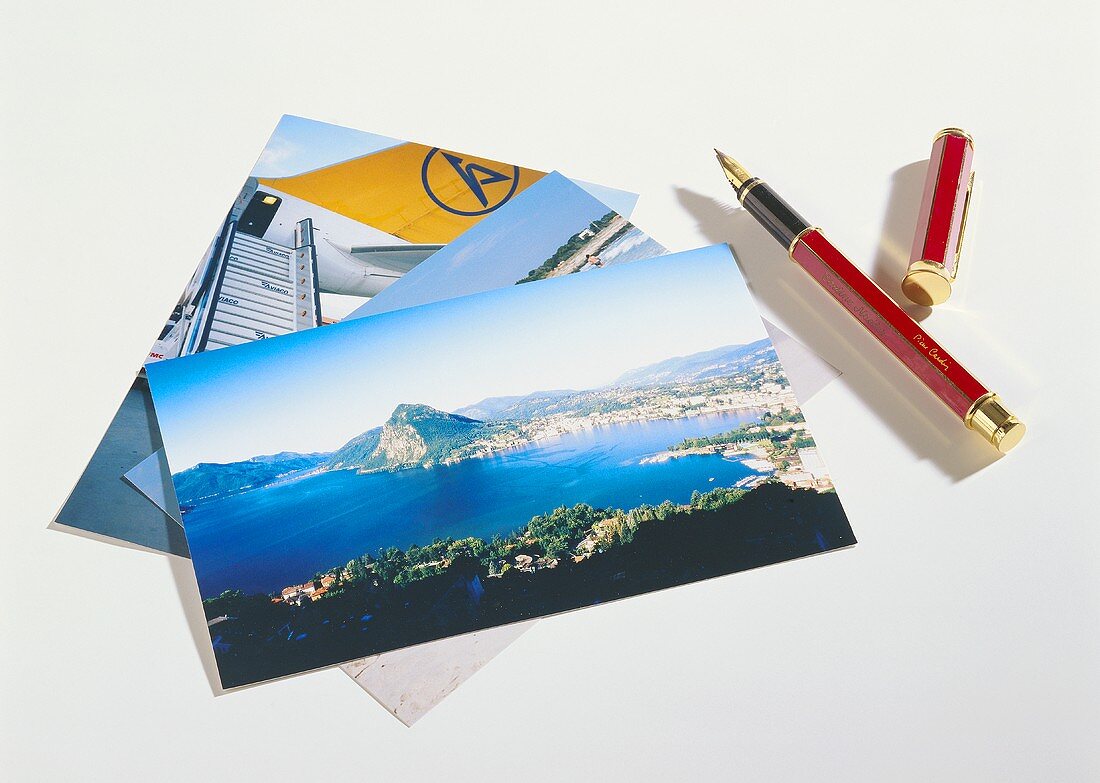 Three different picture postcards and fountain pen