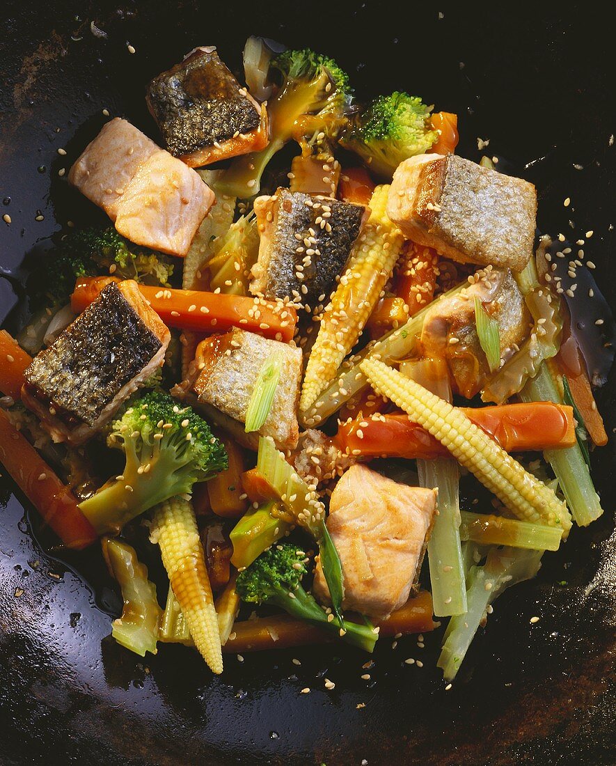 Salmon with Vegetables and Sesame Seeds in a Pan
