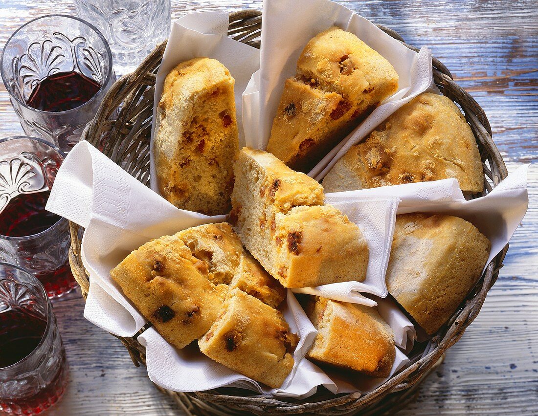 Portuguese bread stuffed with diced sausage in bread basket