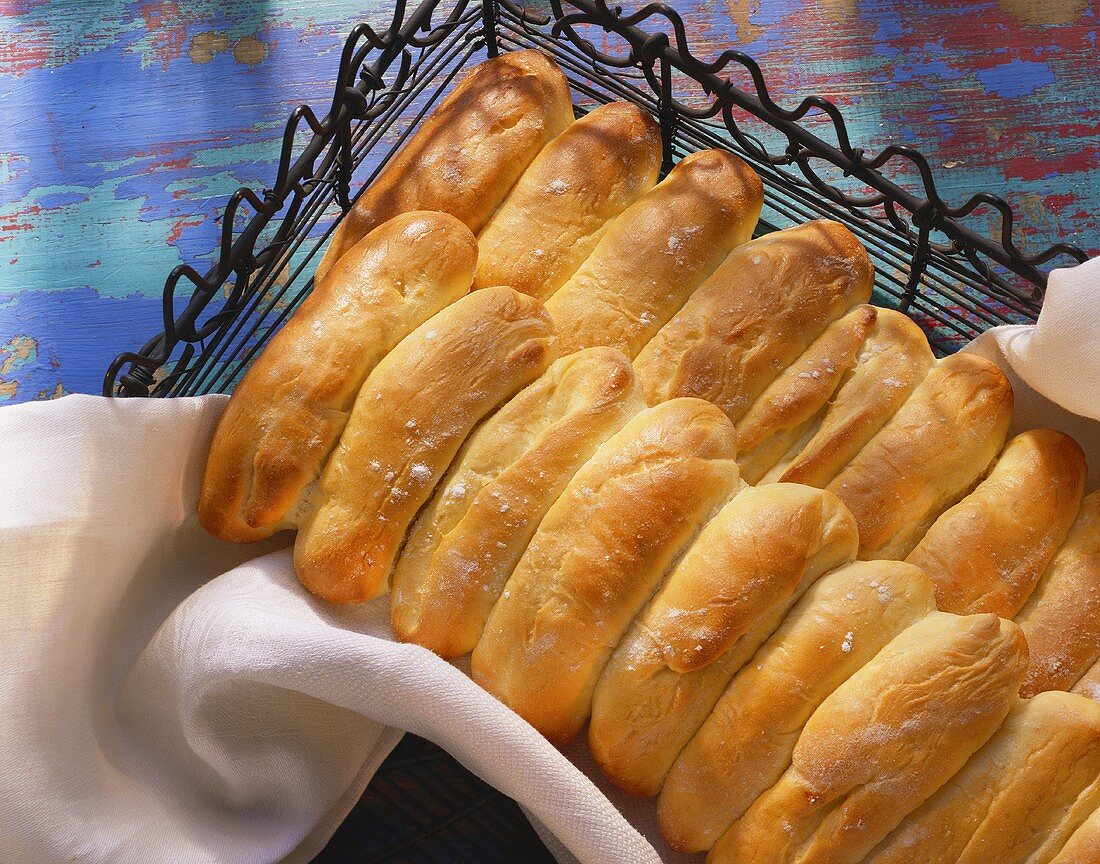 Sweet saffron sticks on white cloth in wire basket