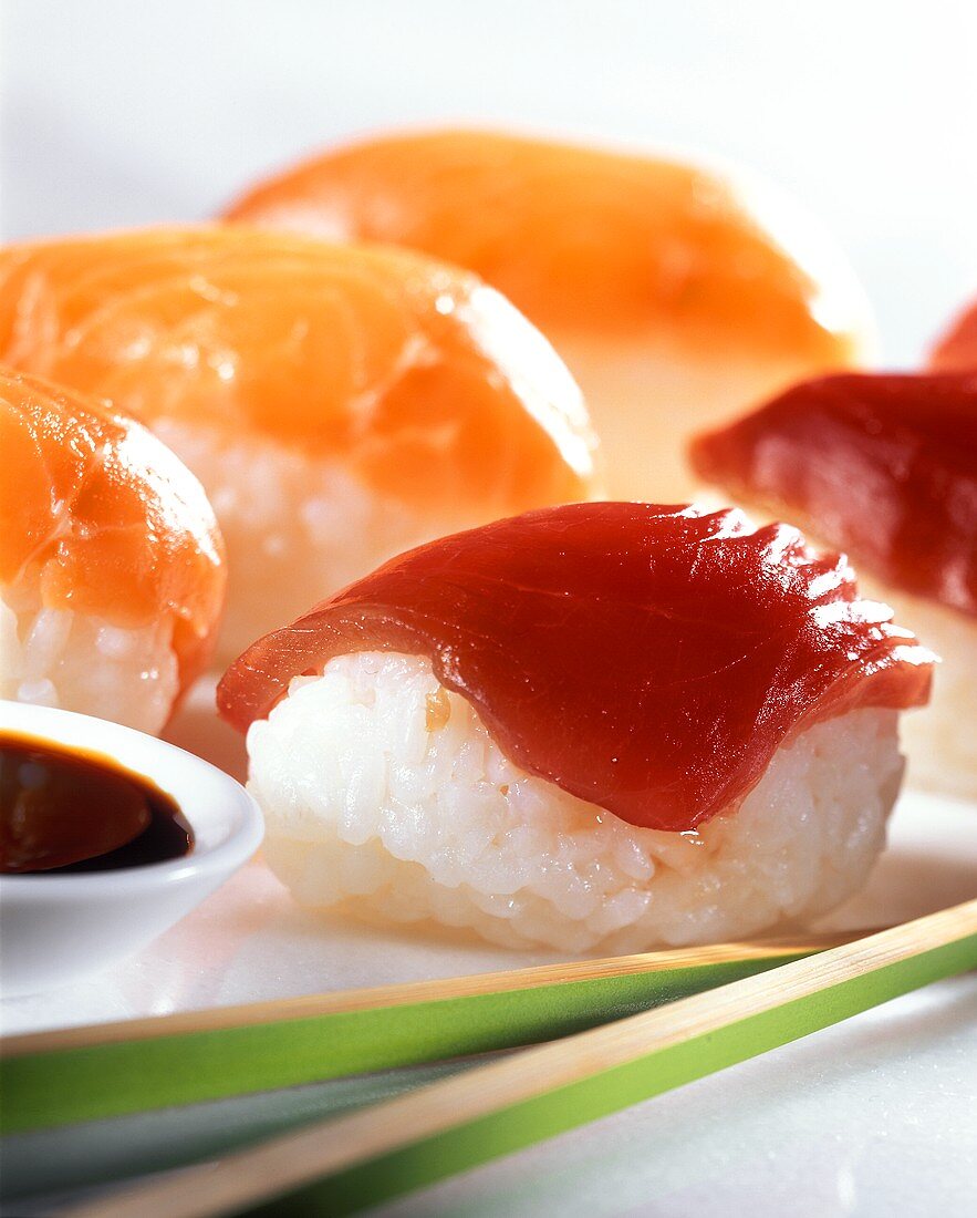 Nigiri sushi with raw salmon and tuna fillet