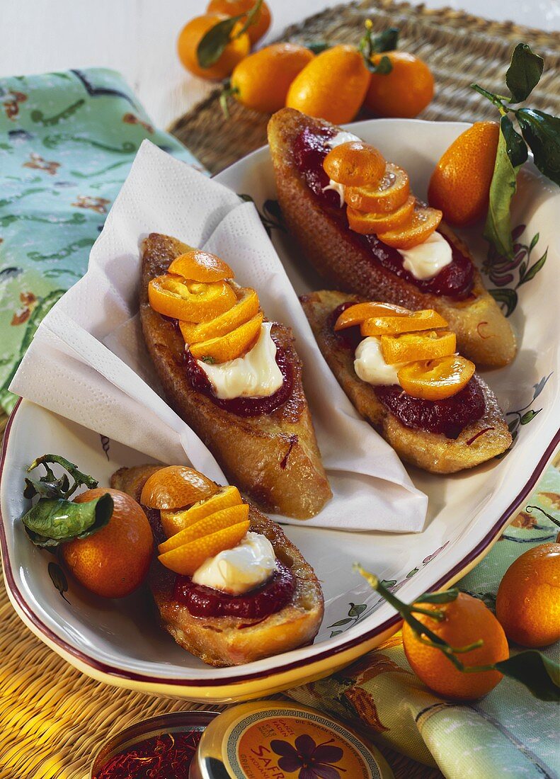 Saffron toast with kumquats and tomato chutney on platter