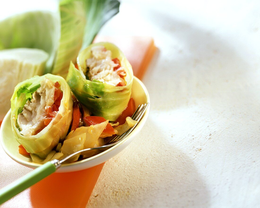 White cabbage & coley parcels with peppers in bowl