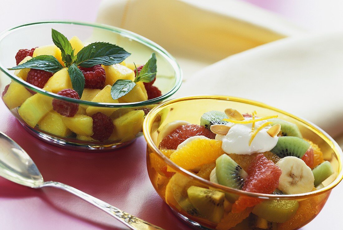 Peach salad with raspberries; fruit salad with flaked almonds