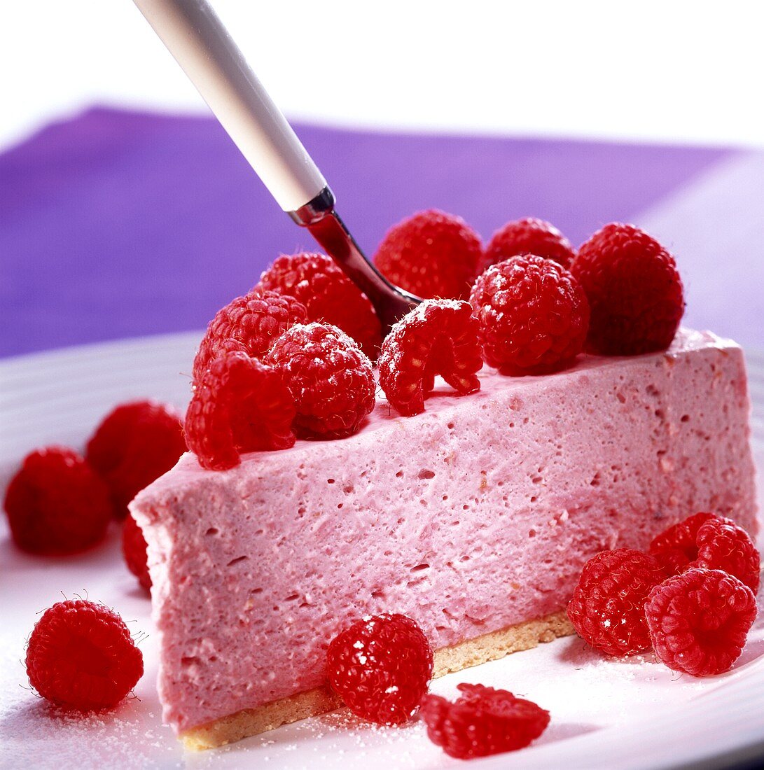 A piece of raspberry cheesecake