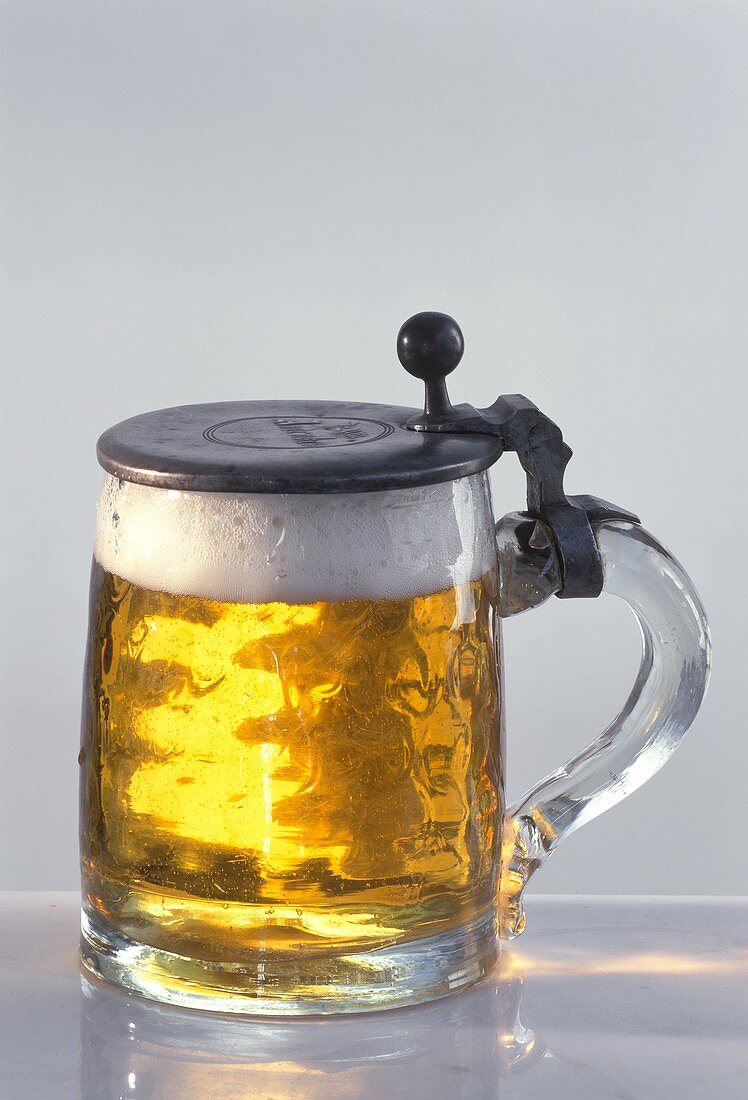 Light beer in Bavarian beer tankard