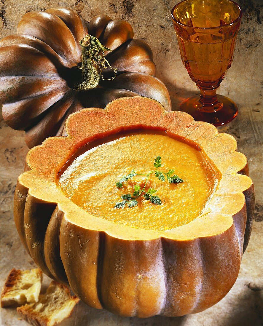 Pumpkin soup in a hollowed out pumpkin