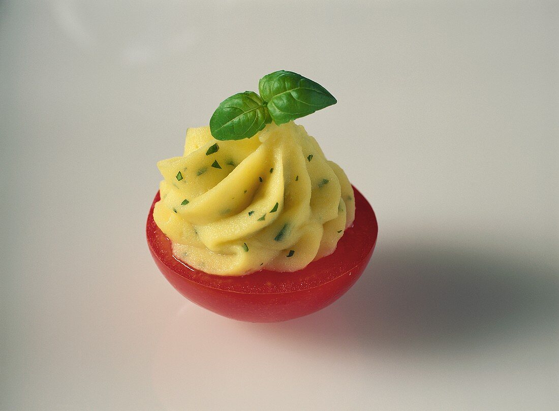 Stuffed tomato with basil mashed potato