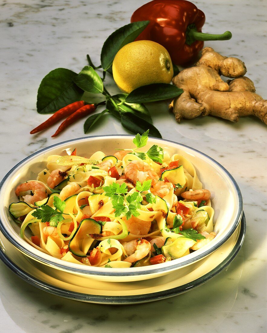 Pasta with shrimps, vegetables and ginger