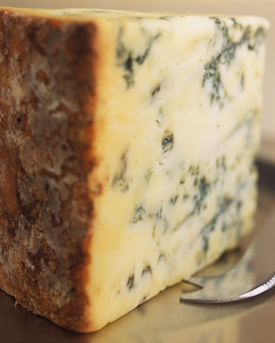 Stilton cheese with cheese knife