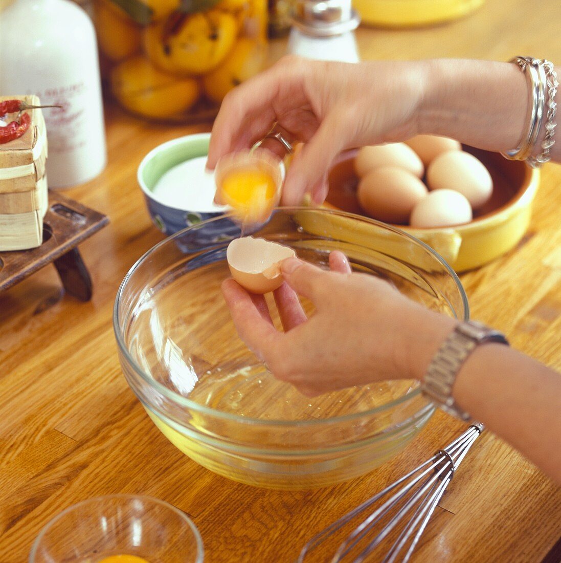 Separating eggs over a dish