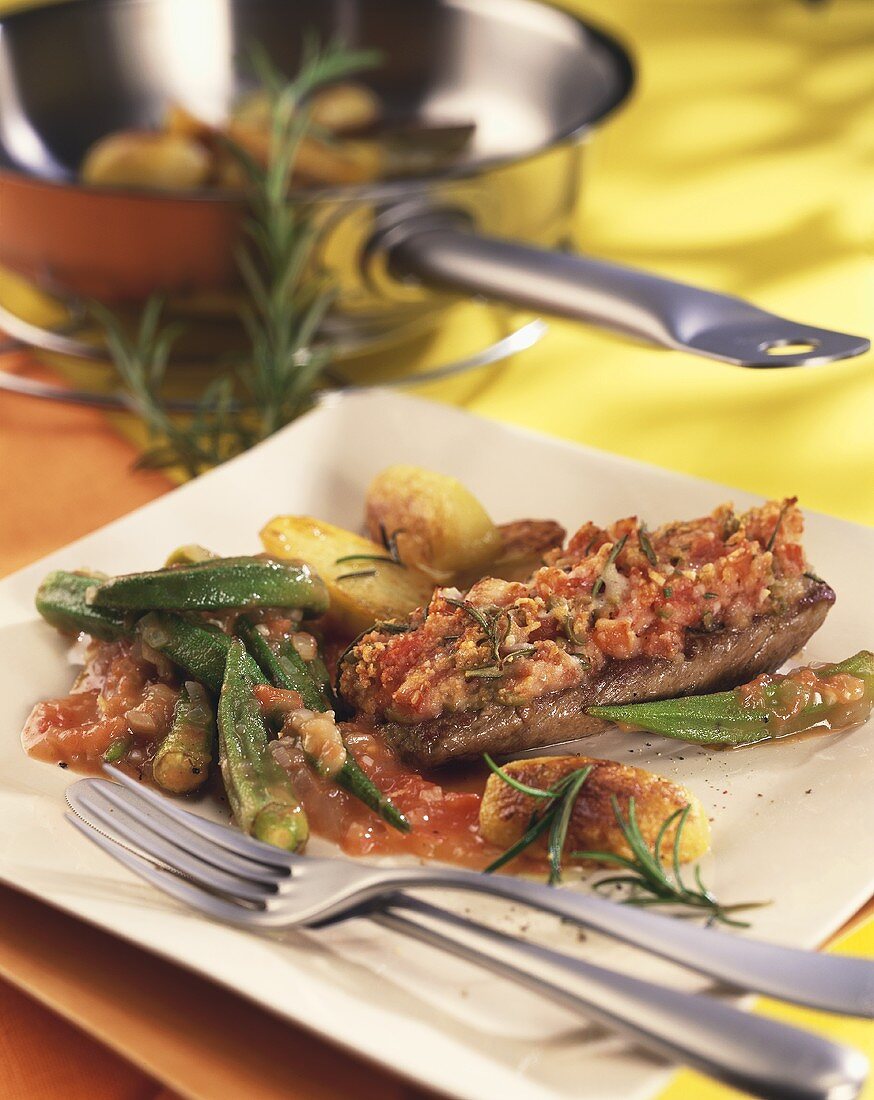 Lamb steaks in tomato crust with okra pods