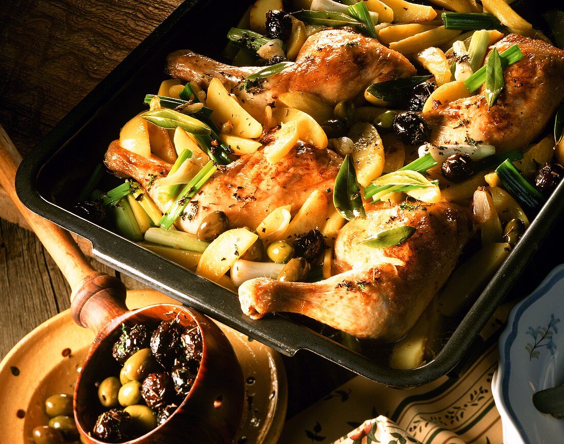 Chicken with herbs and olives, with spring onions