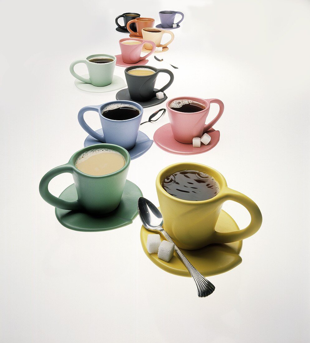Coffee in several colourful cups