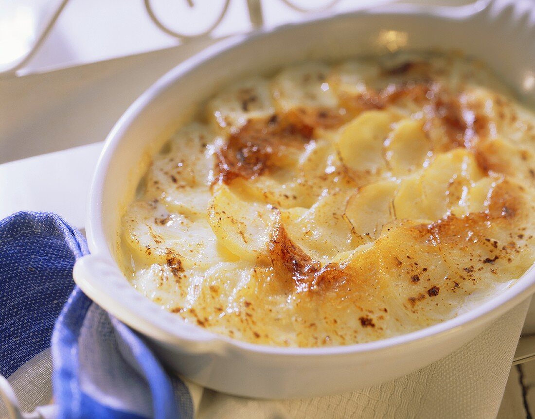 Potato gratin in baking dish