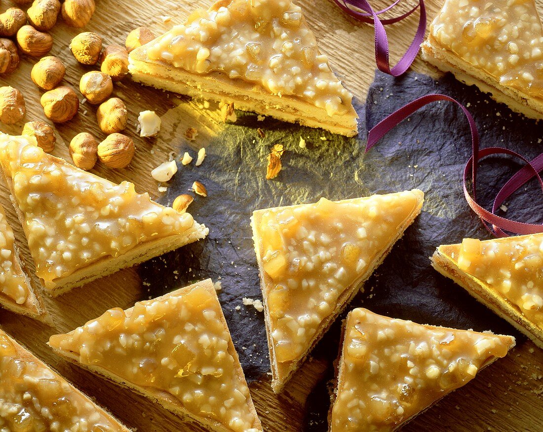 Filled nut triangles with caramel icing