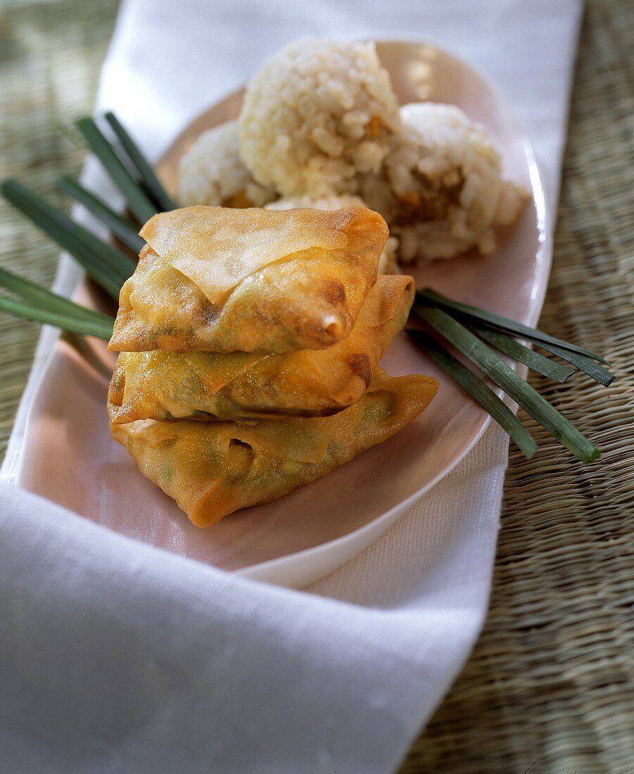 Dim sum: deep-fried pasties & rice balls on platter