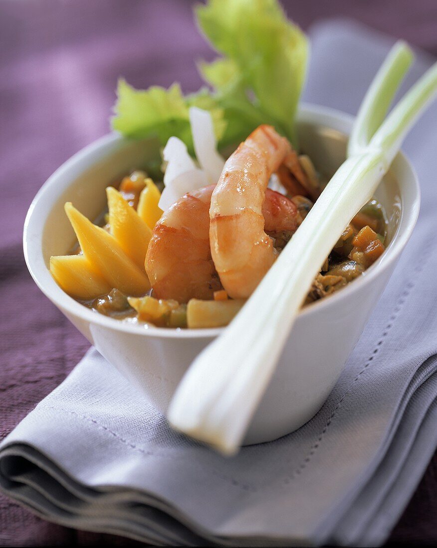 Seafood curry with shrimps and mangoes