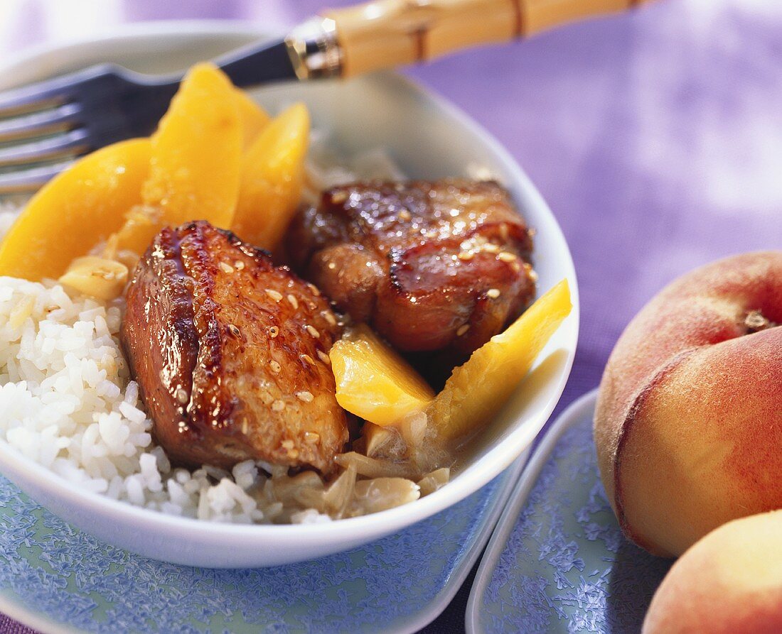 Duck curry with honey, peaches and rice