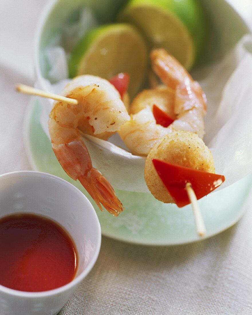 Colourful shrimp kebabs with dip