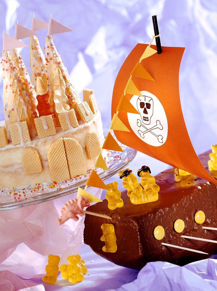 Child's birthday: pirate ship cake and fairy castle cake