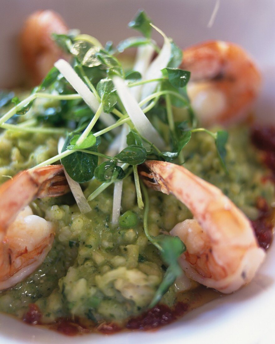 Pea risotto with scampi and watercress