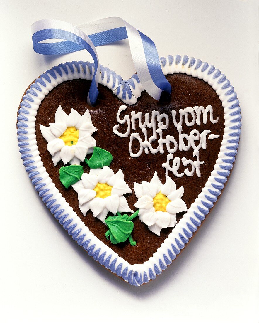 October Festival gingerbread heart with blue and white bow