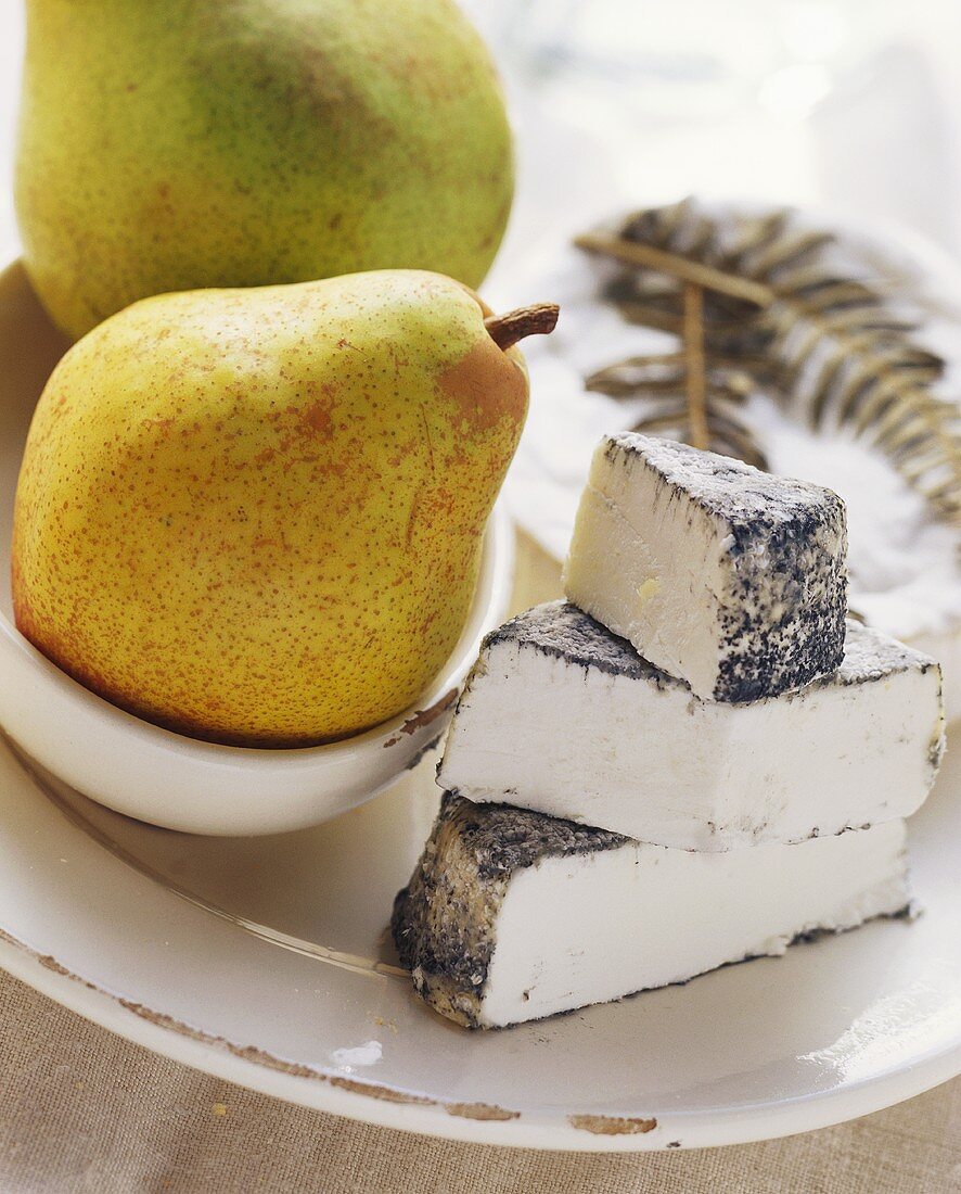 Various types of cheese (Fougeru, Selles sur cher) with pears