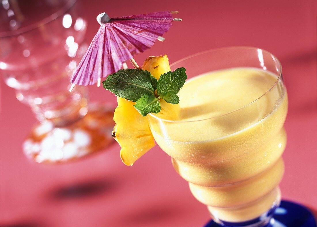 Smoothie with exotic fruits, coconut milk and rum