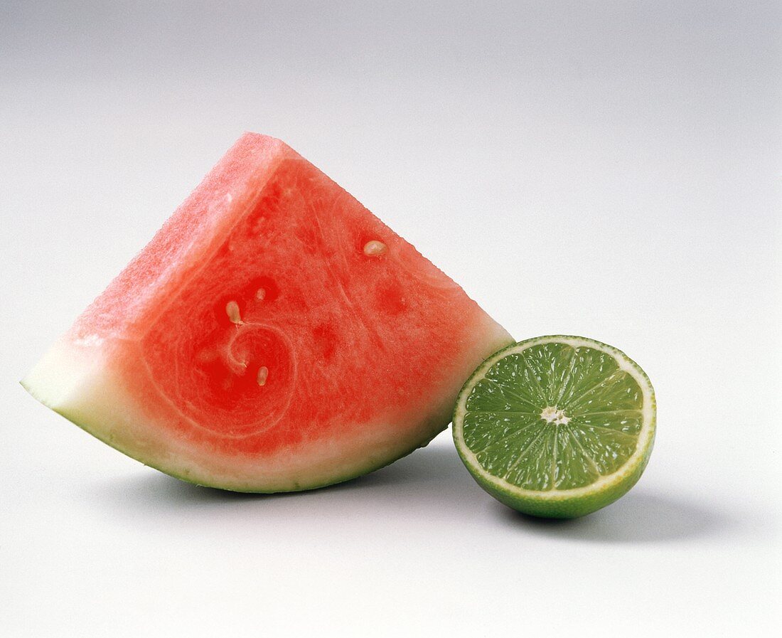 Slice of water melon and half a lime