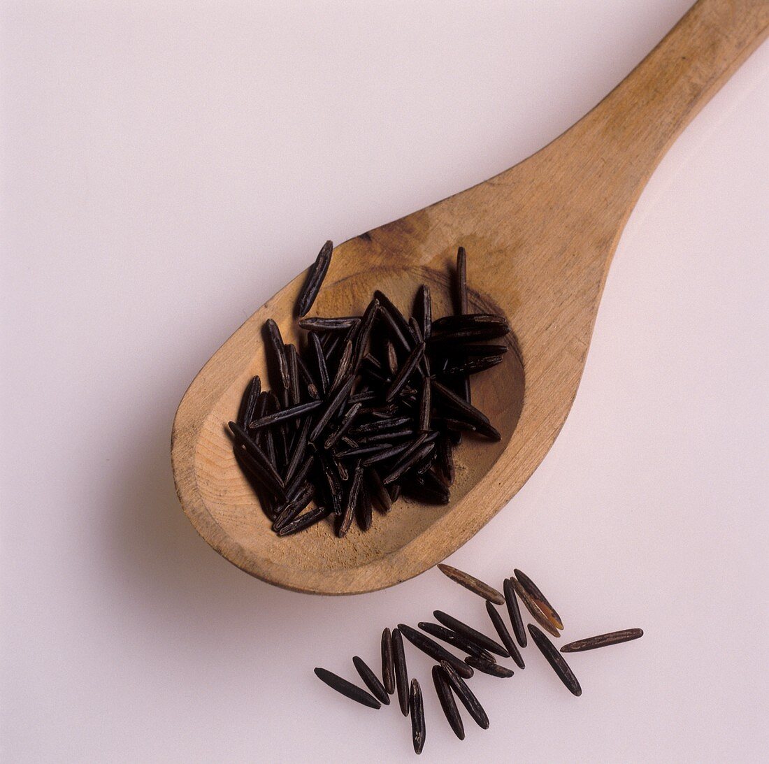 Wild rice on a wooden spoon