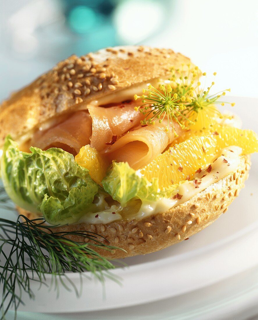 Sandwich with smoked salmon, oranges and mayonnaise