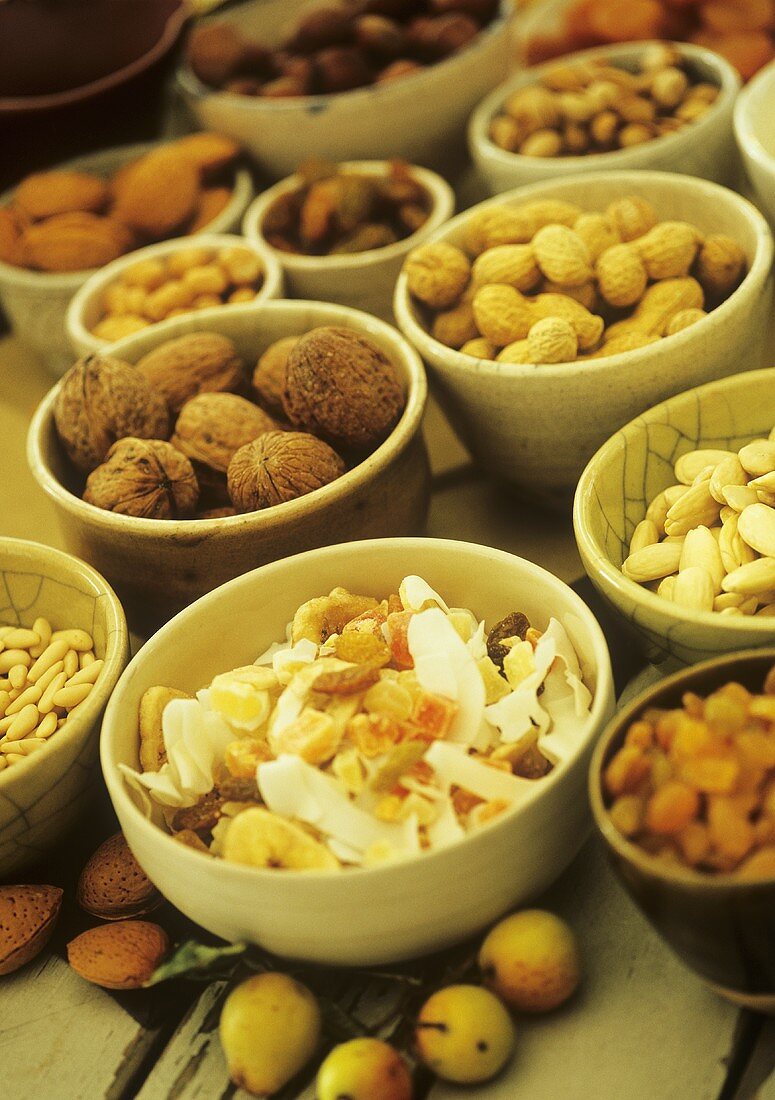 Various dried fruits and nuts in bowls
