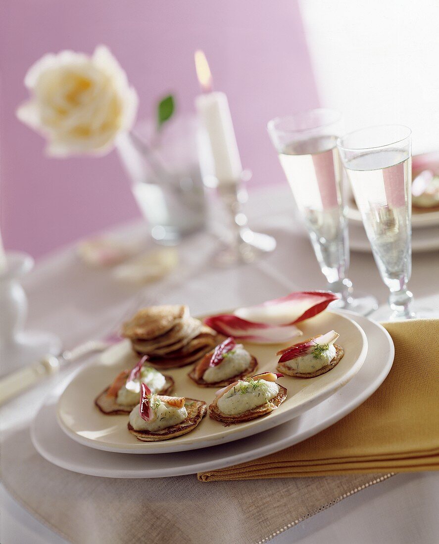 Blinis with fennel mousse and smoked trout