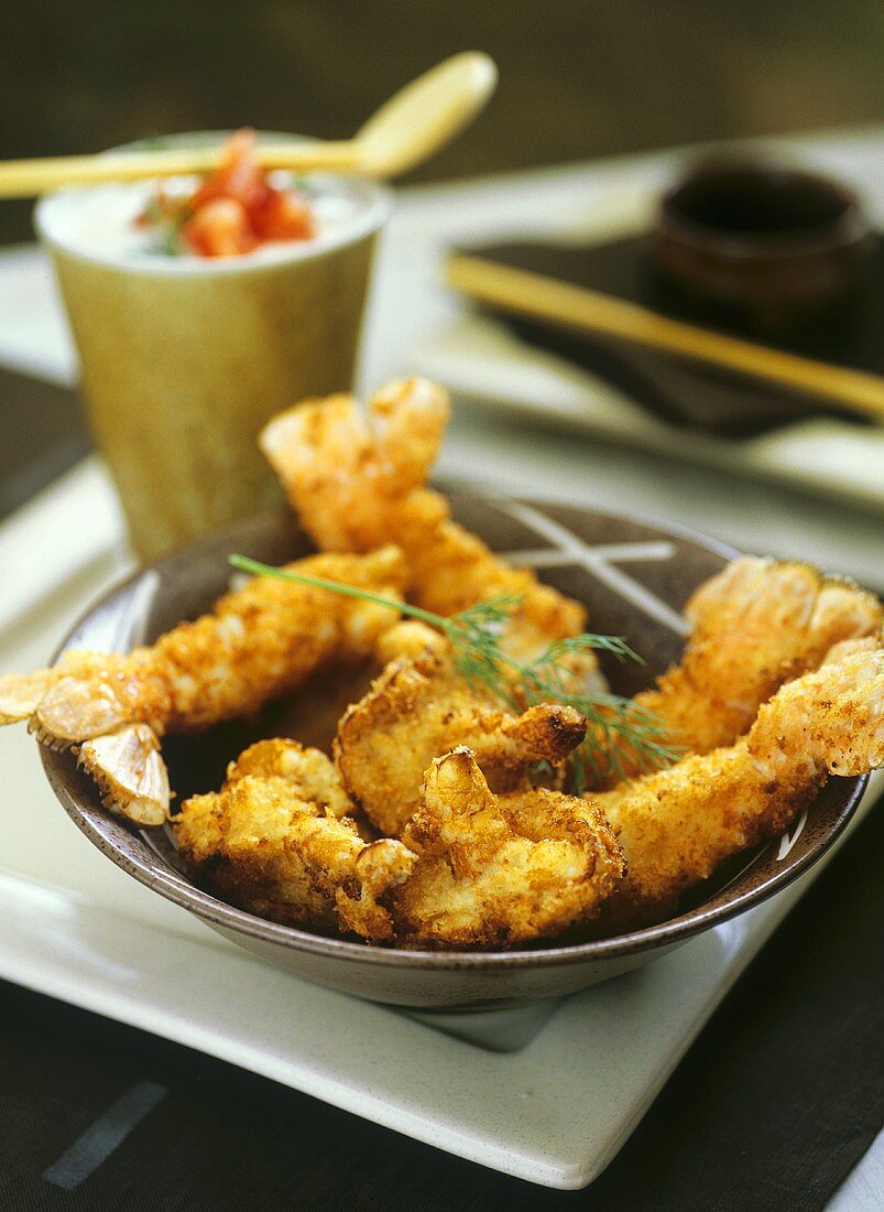 Deep-fried scampi and chanterelles on plate