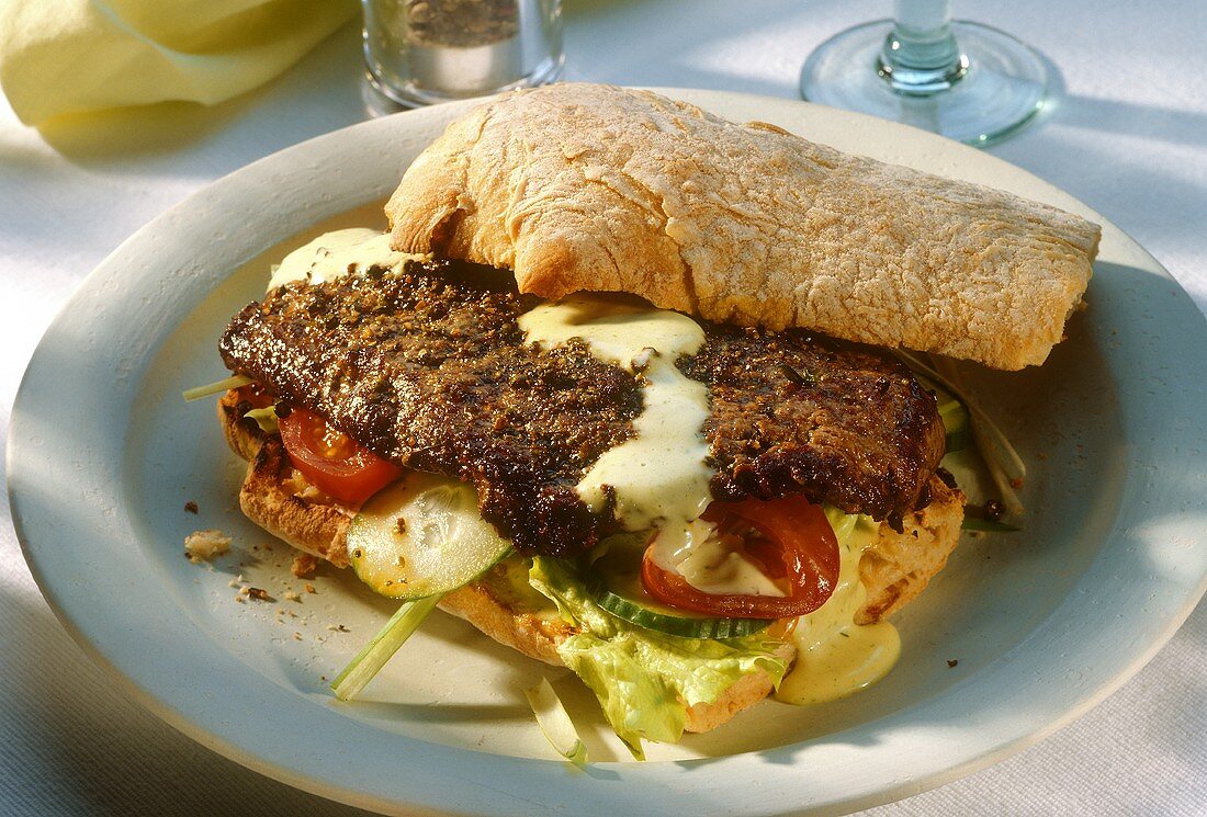 Ciabatta sandwich with beef steak and thyme mayonnaise