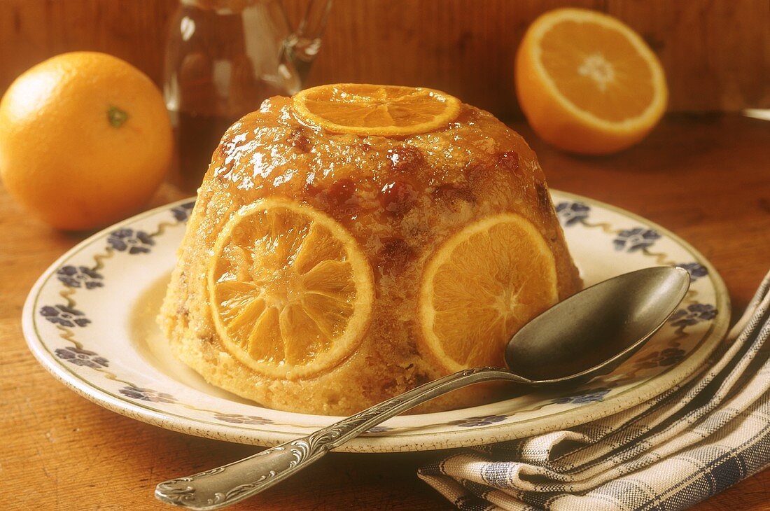 Orange and ginger pudding on plate