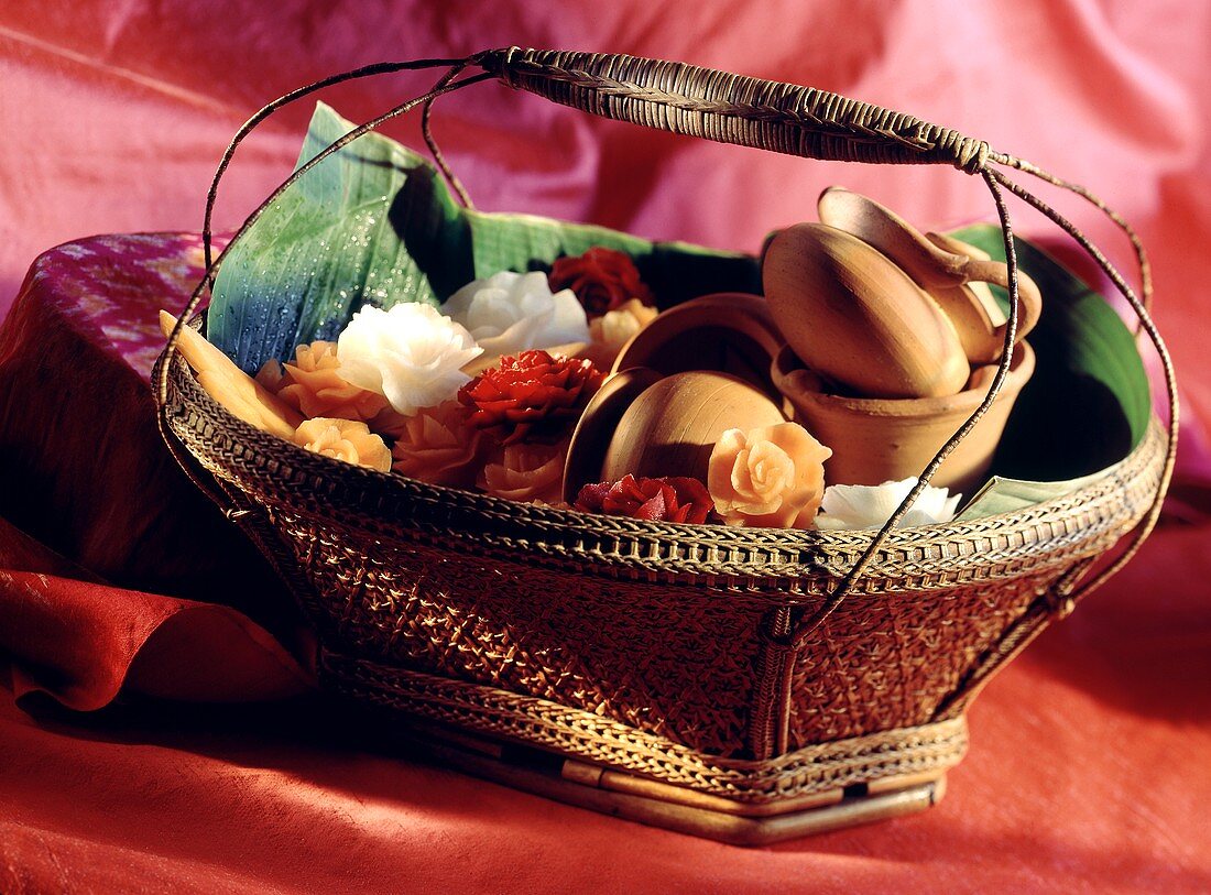 Flowers carved out of vegetables in a basket