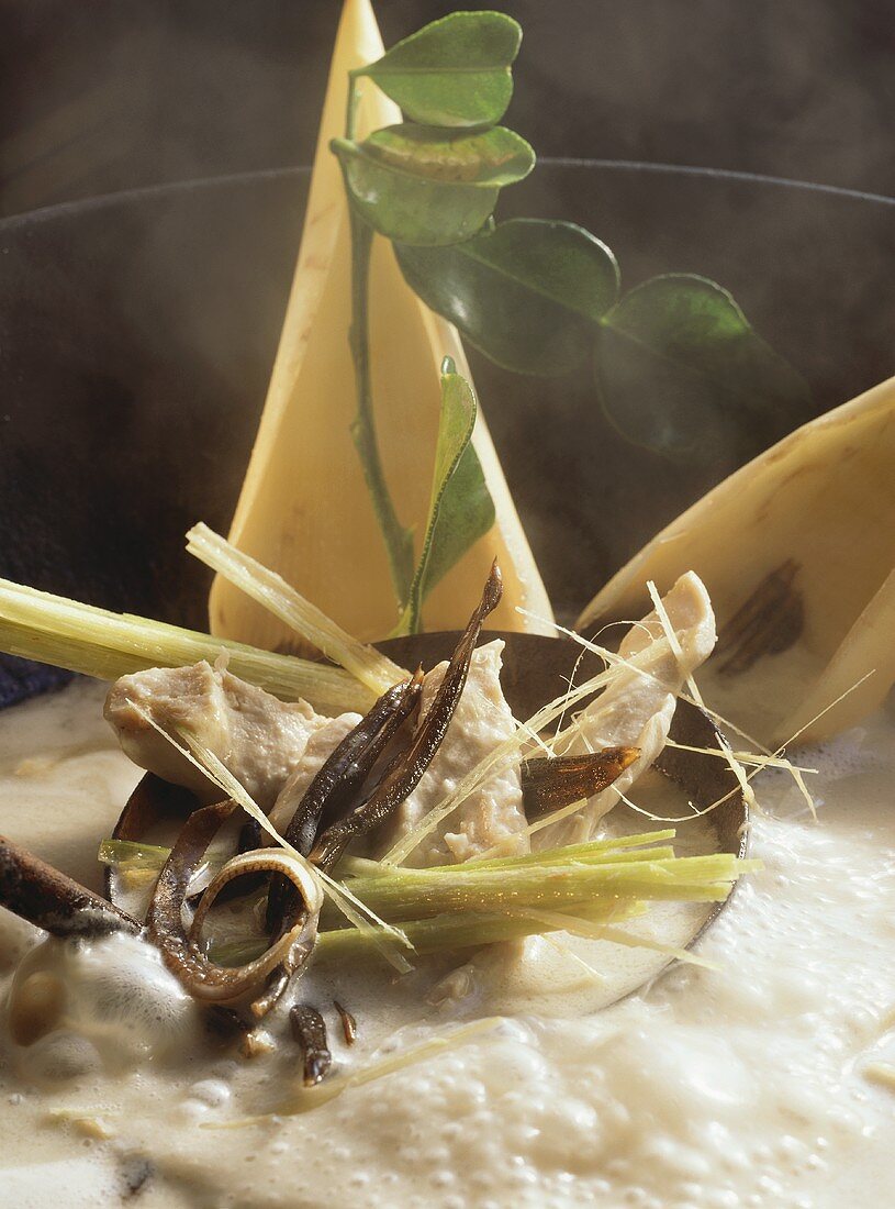 Steaming chicken soup with banana flowers & coconut milk