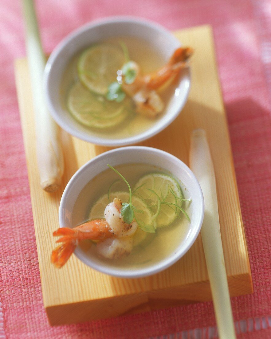 Lemon grass soup with shrimps and lime slices