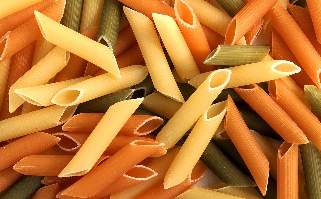 Colourful penne (filling the picture)