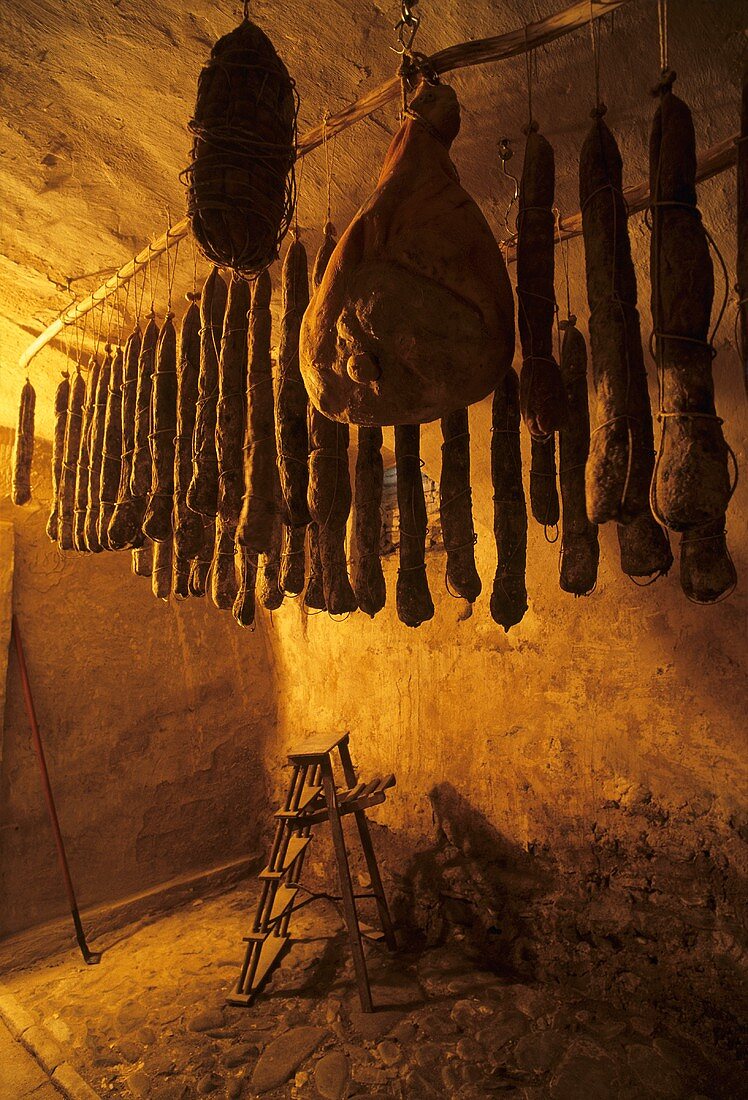 Parma ham, salami and sausages in the cellar at Hotel Torre
