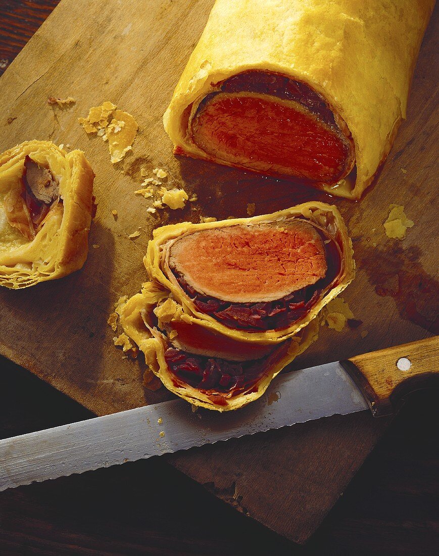Beef Welling in pastry case on chopping board