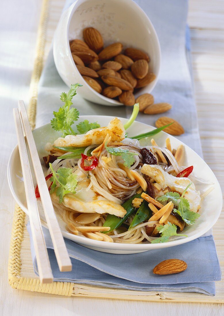 Rice noodles & monkfish, vegetables, almonds & coriander leaves