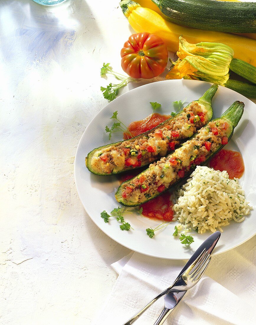 Stuffed courgettes with mince, rice and tomato sauce