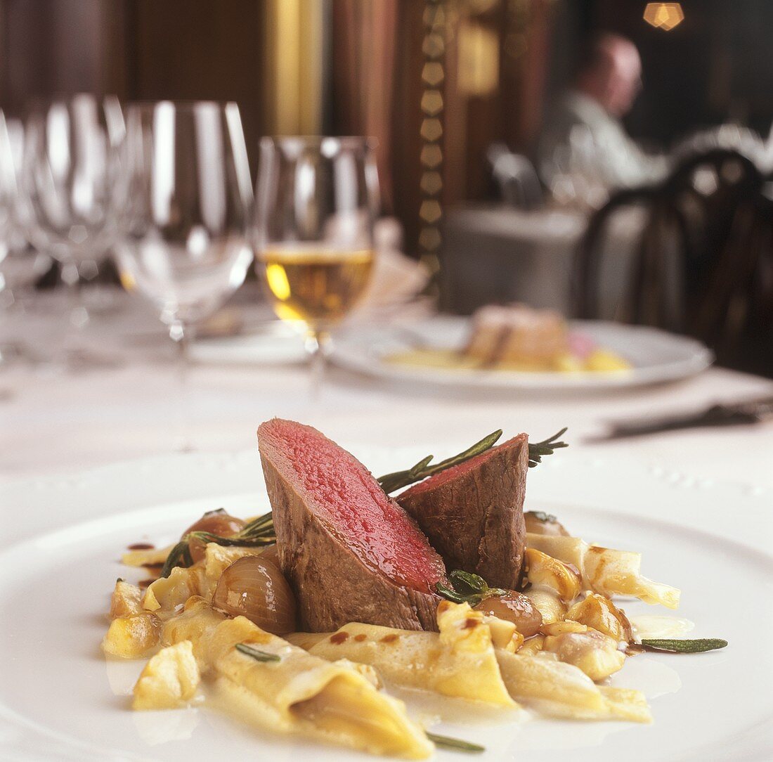 Saddle of venison with chestnut noodles & glazed pearl onions