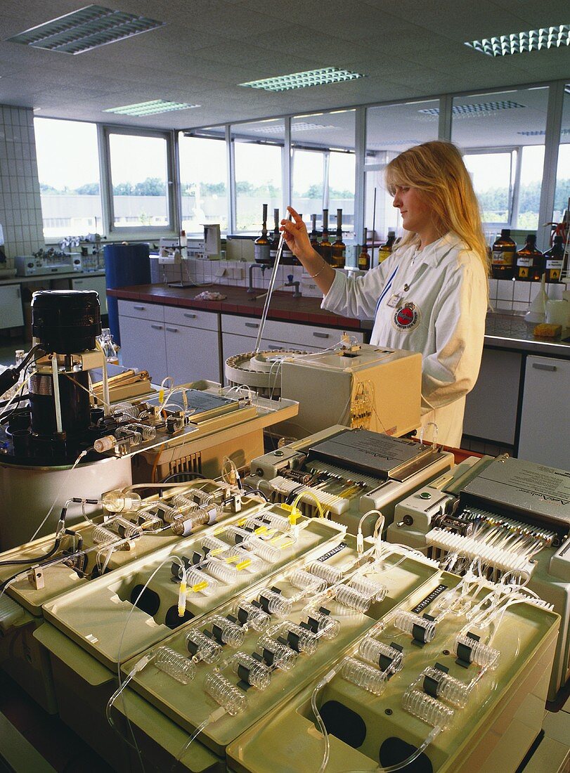 Laboratory assistant testing tannic acid etc in brewery lab