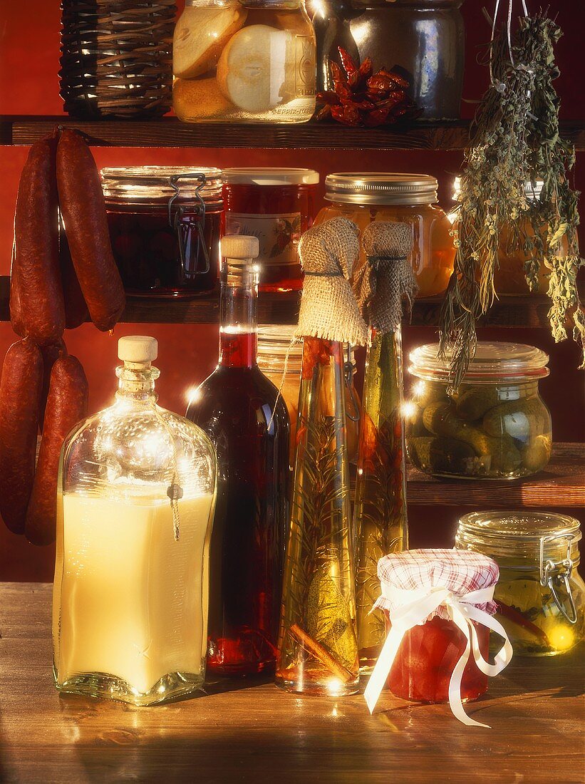 Various preserving jars, sausages, oils etc, in pantry
