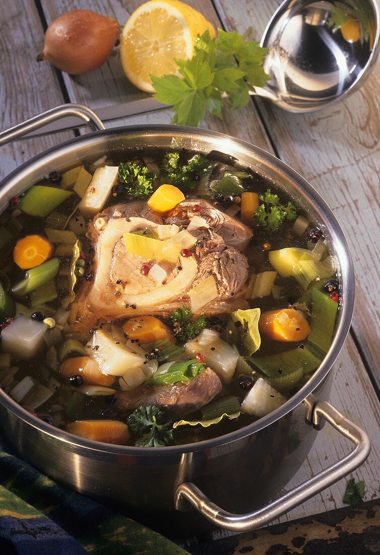 Meat broth in soup pot