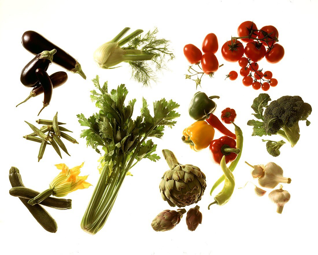 Various fresh vegetables, arranged in groups